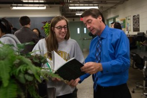 Students with undeclared majors meet CANR's Dean, Mark Rieger, and pot plants in Fischer Greenhouse.